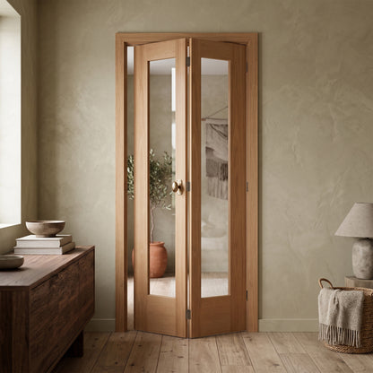 Oak Internal Fully Finished Pattern 10 1 Light Clear Glass Bi-Fold Door