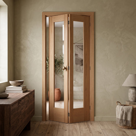 Oak Internal Fully Finished Pattern 10 1 Light Clear Glass Bi-Fold Door